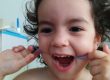 Emanuelle 2.9 y/o using the Gummy Floss™ and having fun!